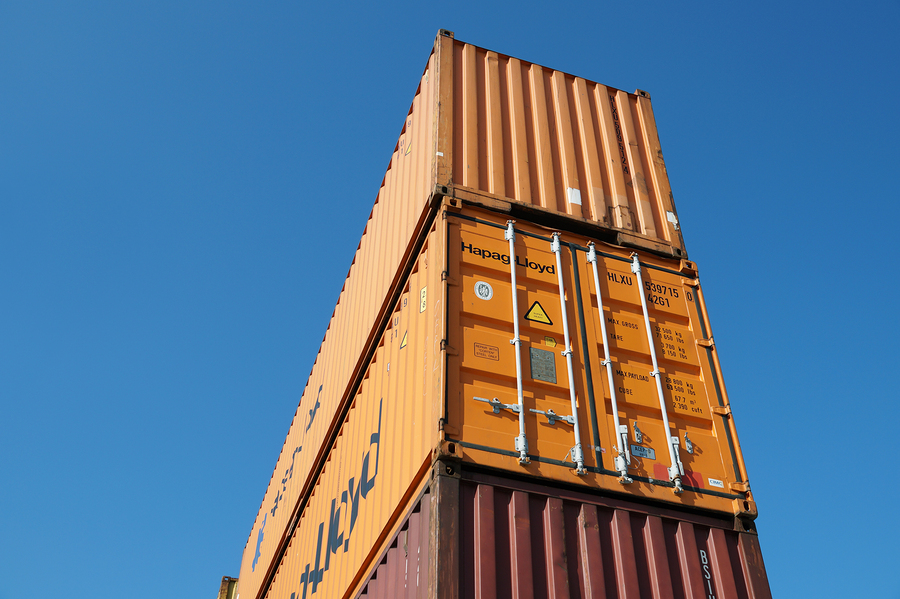 K&K International shipping containers stacked at Washington DC area yard