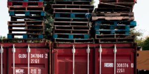 row of red shipping containers